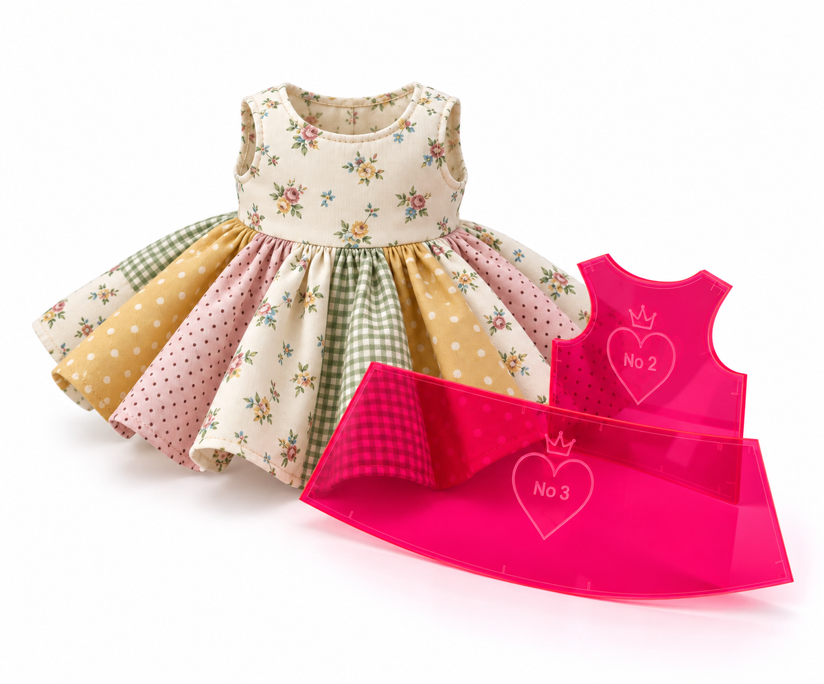 Example floral patchwork dress beside pink acrylic pieces. The acrylic pieces illustrate the pink acrylic appearance and are not the actual pattern pieces supplied.