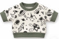 Finished space-print jumper with green ribbed trim, shown as a sewing example