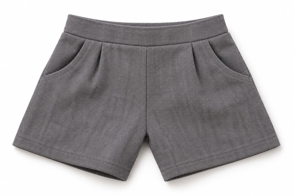Finished grey trousers with waistband and pockets, shown as a sewing example