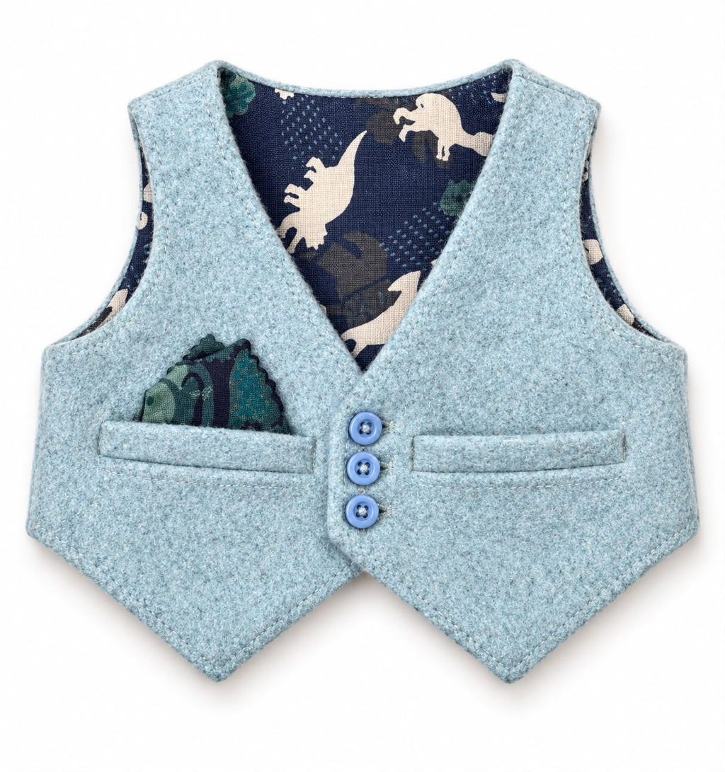 Finished waistcoat example with blue buttons and dinosaur-print lining