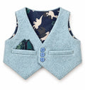 Finished waistcoat example with blue buttons and dinosaur-print lining